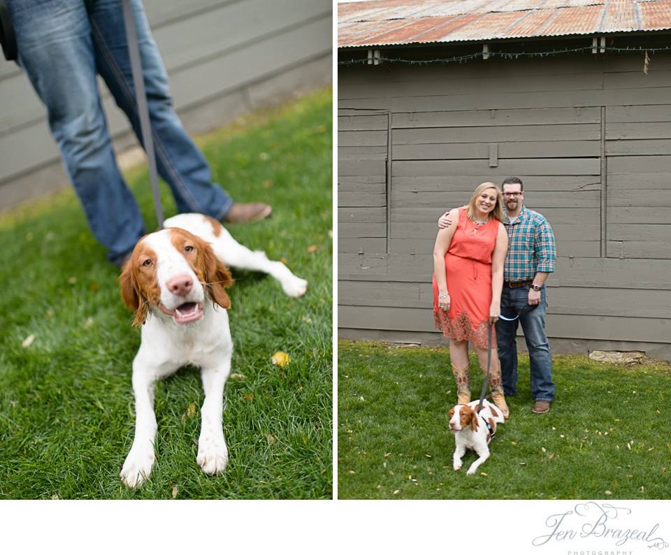 couple kissing with dog