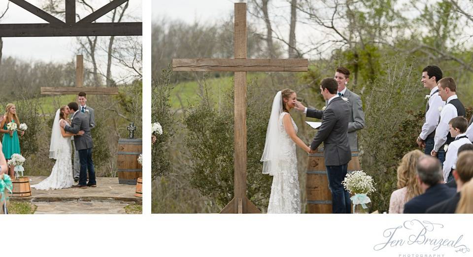 groom wiping tear off bride