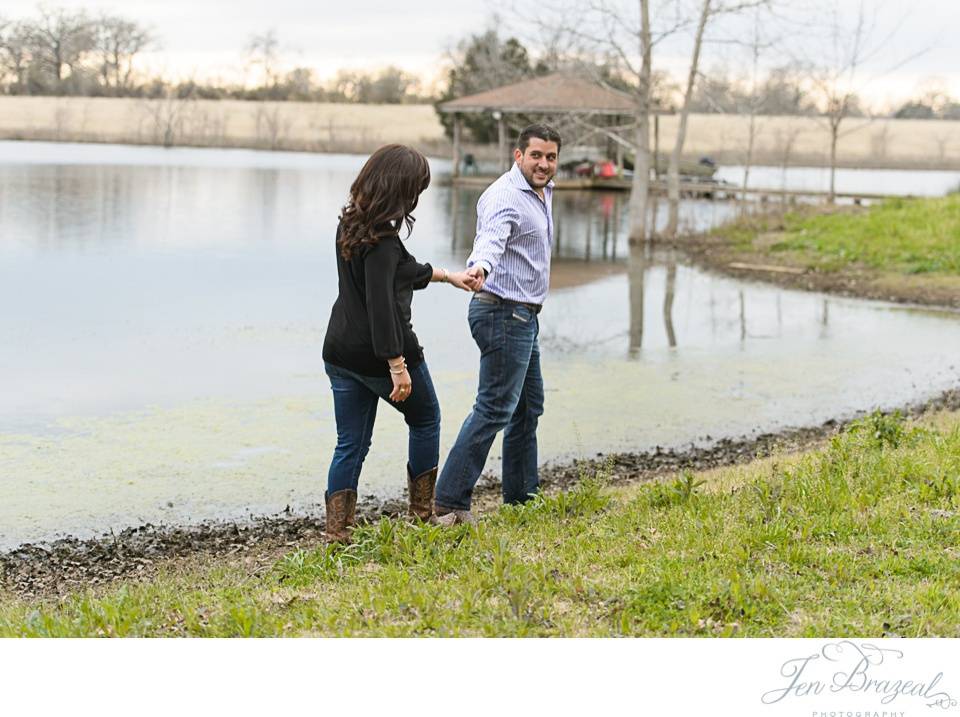 couple walking by the water